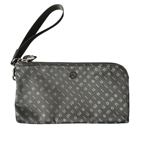 lululemon Lululemon Curved Wristlet Motif Wallet Phone Carrier Wristlet - Picture 1 of 4